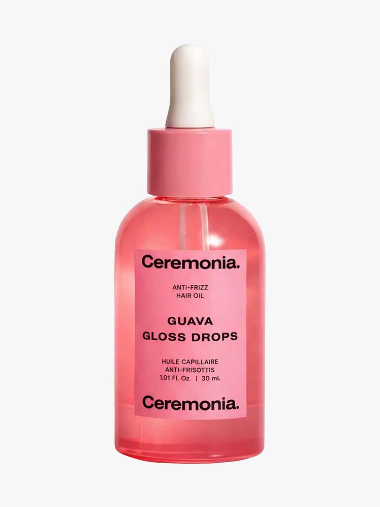 Ceremonia Guava Gloss Drops pink serum bottle on light gray background