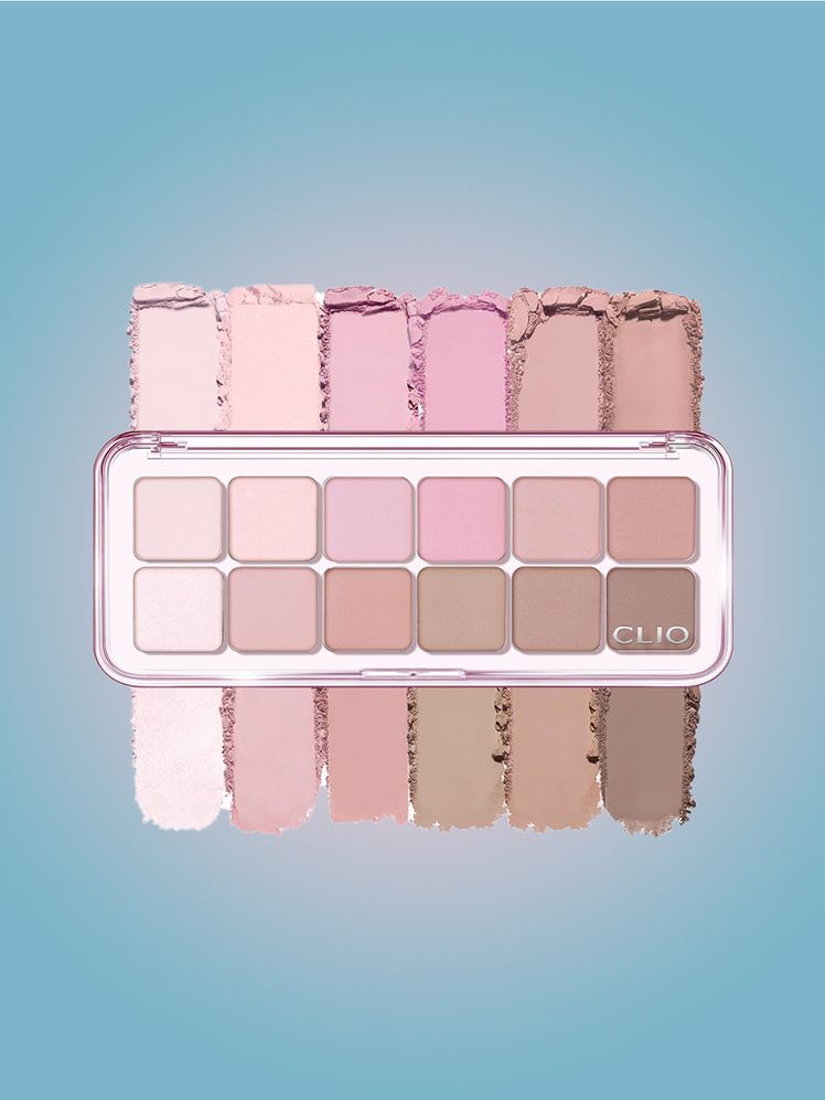 Clio Pro Eye Palette Air in Peach Apple Mate light pink and brown eye shadow palette on blue background