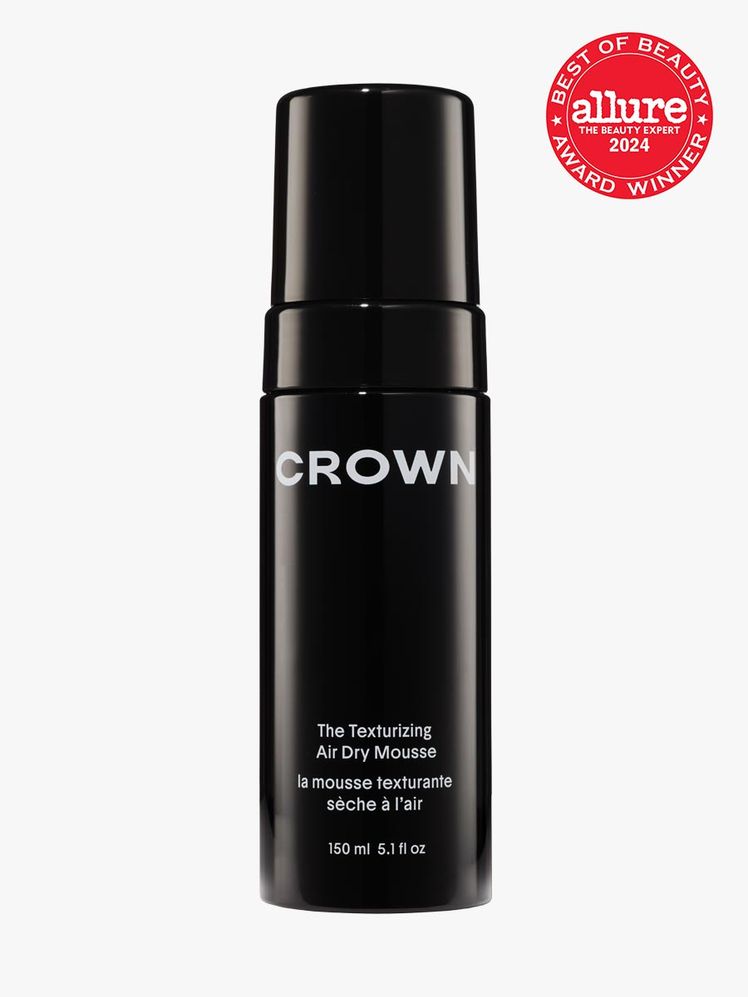 mousse in branded black bottle with cap on light gray background with red and white 2024 allure best of beauty seal