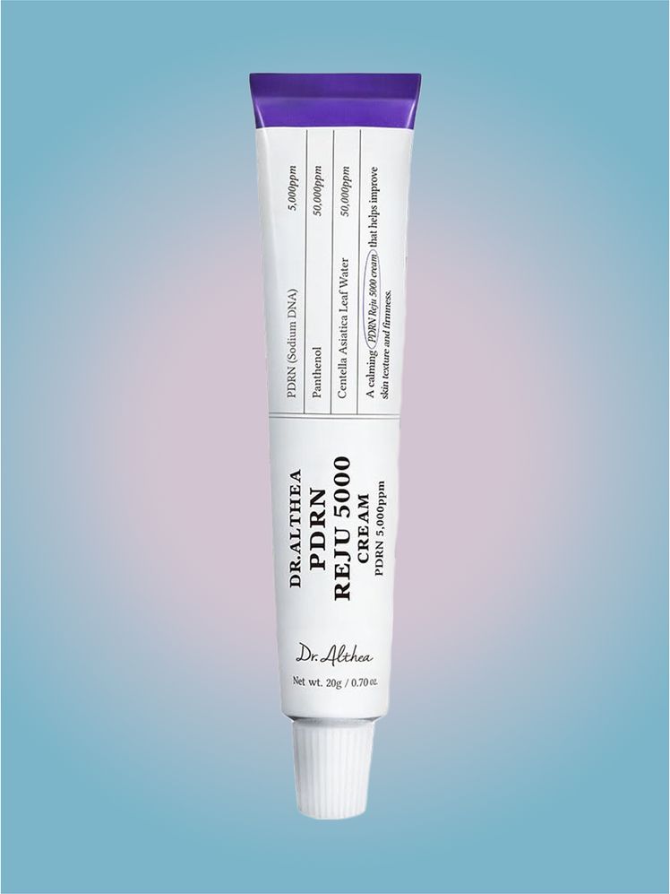 Dr. Althea PDRN Reju 5000 Cream in branded tube component on a pink and blue component