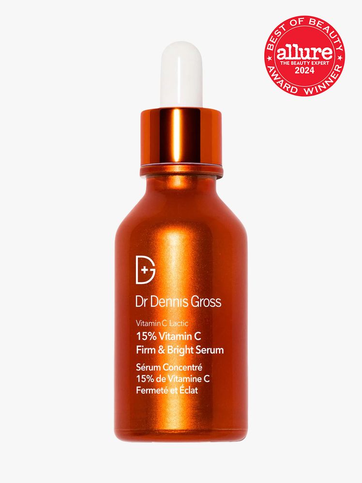 antioxidant serum in branded bright orange bottle with white and orange pipette on light gray background with red and...