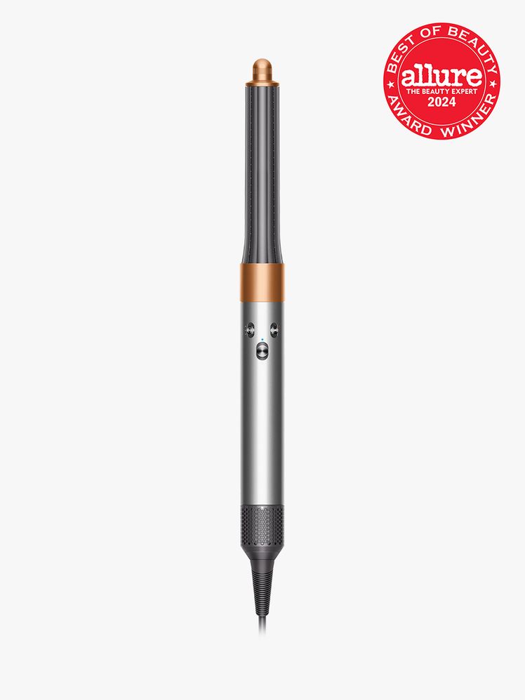 dyson airwrap in silver and copper color way on light gray background with red and white 2024 allure best of beauty seal