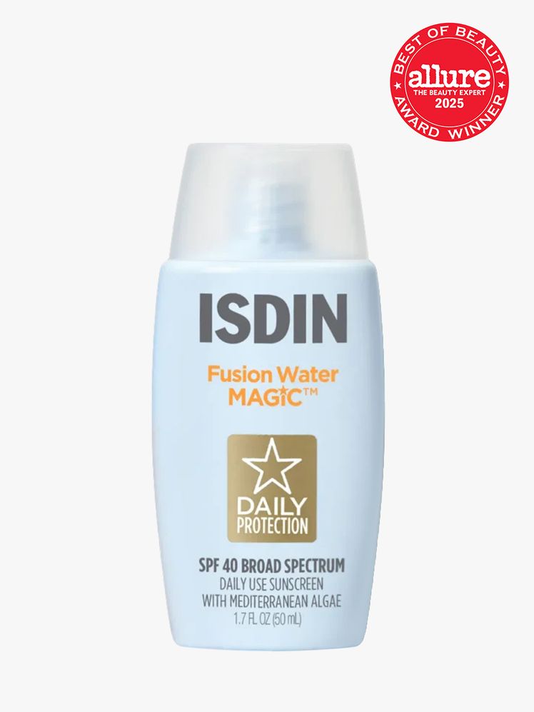 Isdin Fusion Water Magic SPF 40 in branded blue bottle with clear cap on light gray background with red Allure Best of...