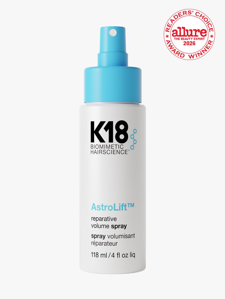Bottle of K18 AstroLift Reparative Volume Spray on a white background