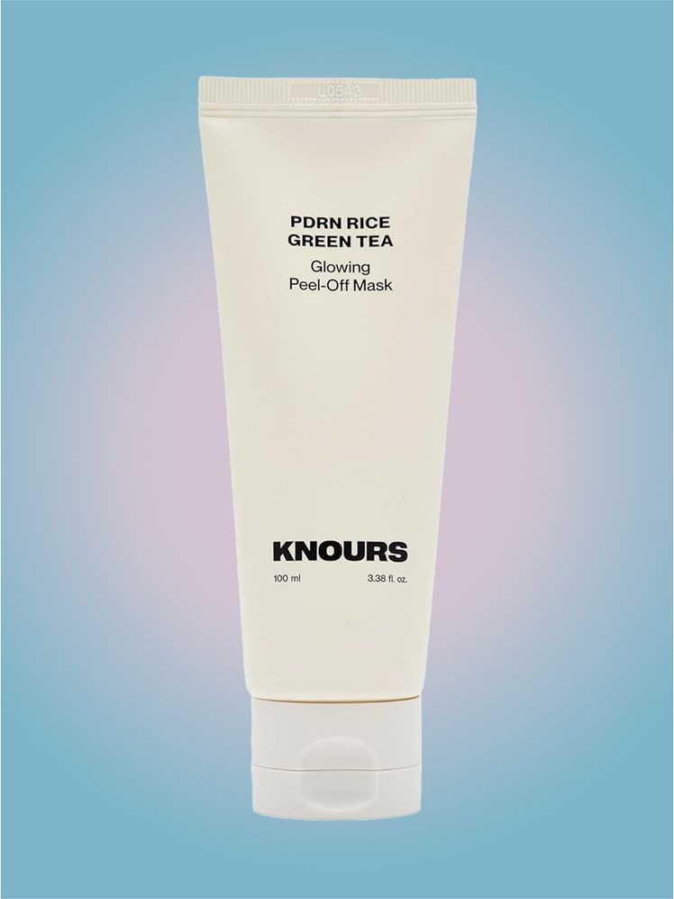 Knours PDRN Rice  Green Tea Glowing Peel Off Mask in branded tube component on a pink and blue background