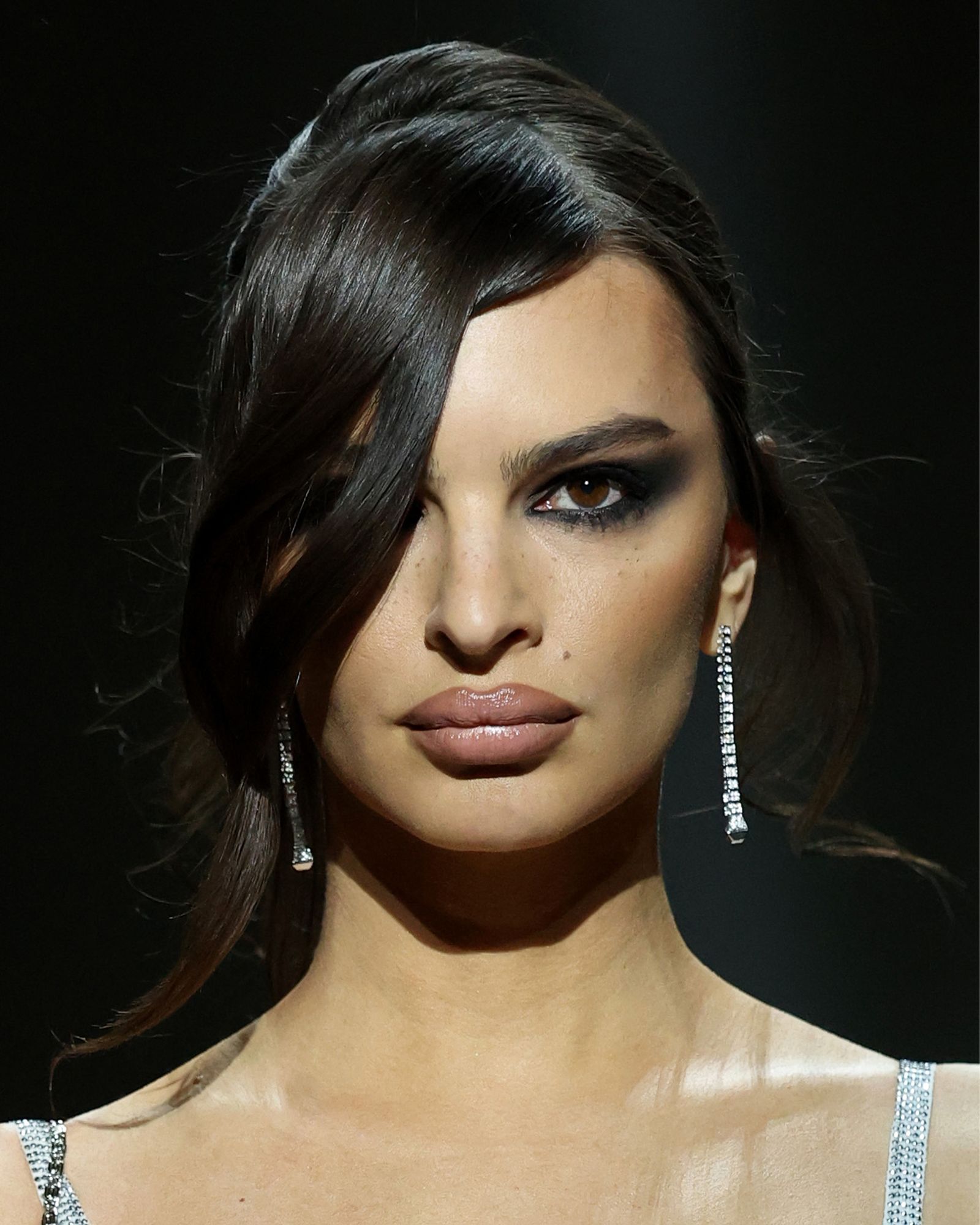Closeup of Emily Ratajkowski with livedin smoky eye makeup.