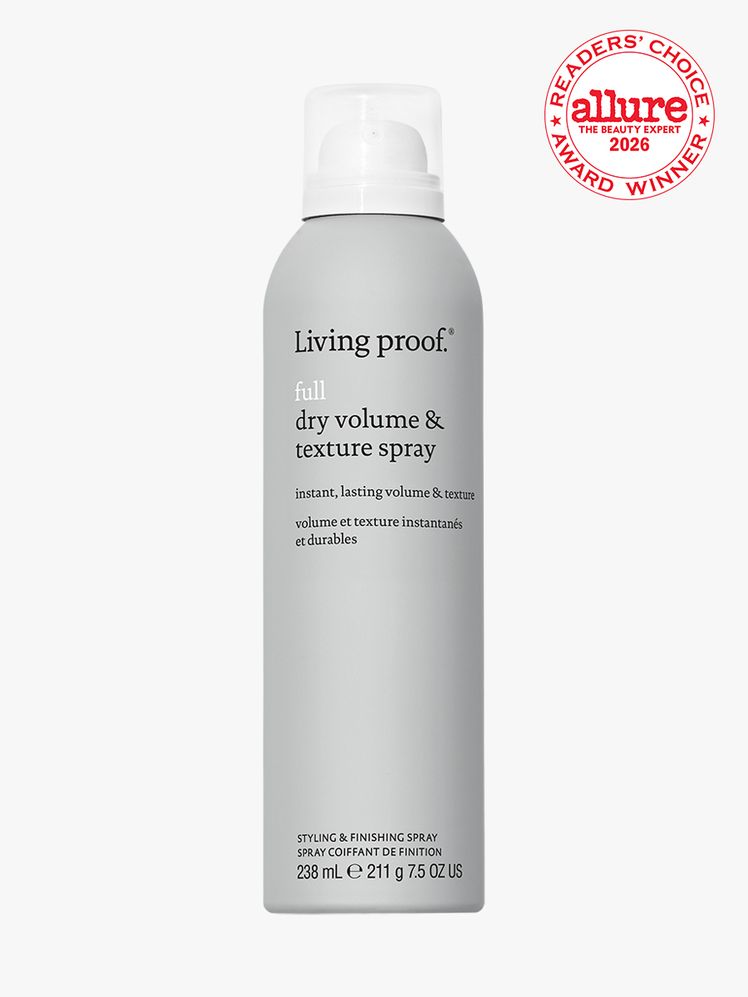 Grey spray bottle of Living Proof Full Dry Volume Texture Spray on white background