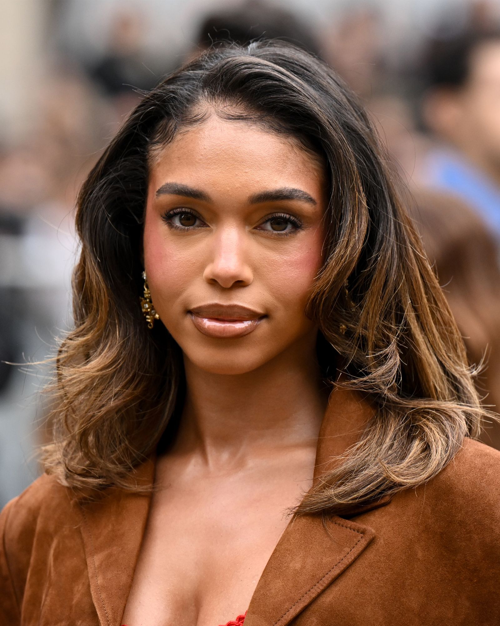 Closeup of Lori Harvey with collarbone lob.