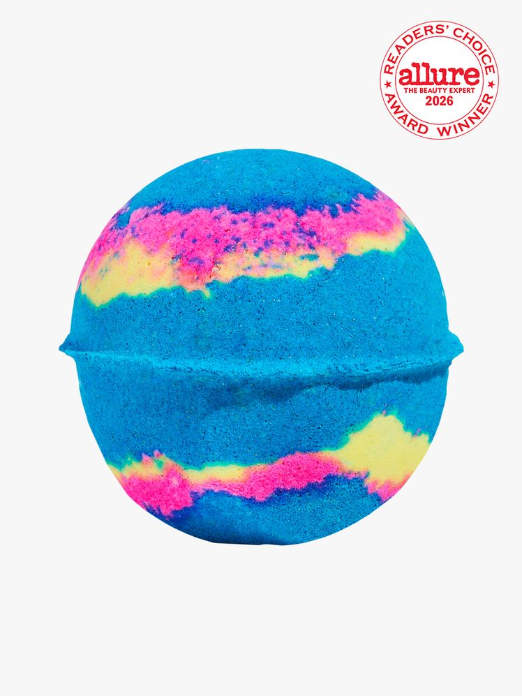 A colorful Lush Bath Bomb on a white background