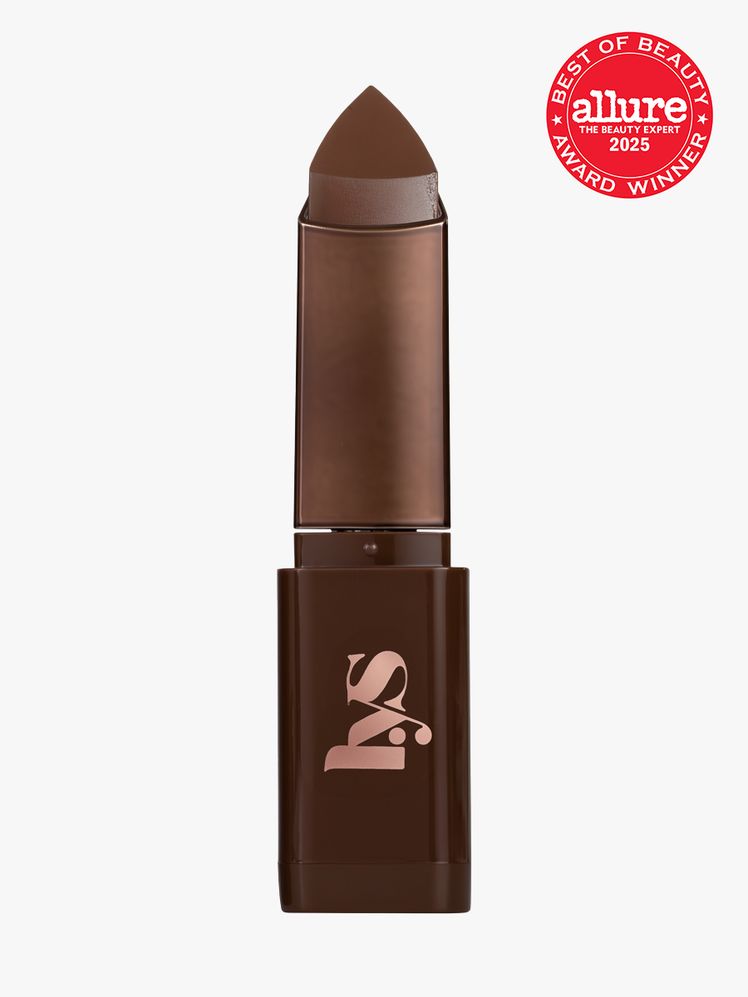 LYS Beauty Triple Fix Blurring Skin Tint Foundation Stick in branded dark brown twist up component on light gray...