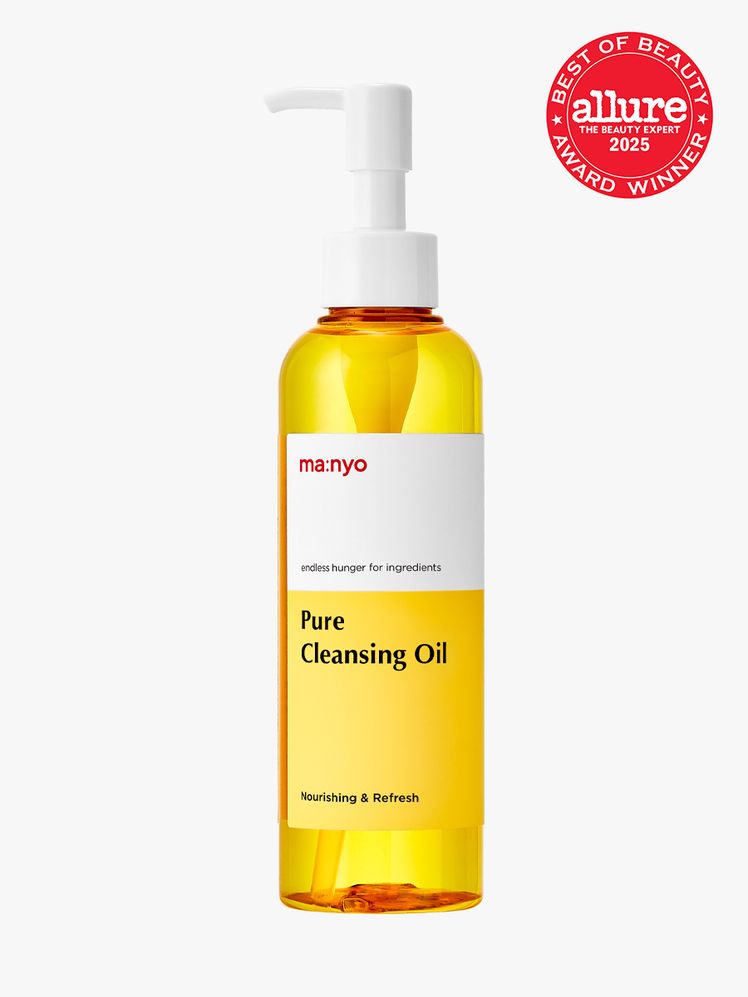 manyo Pure Cleansing Oil orange bottle of facial cleansing oil with white pump on light gray background with red Allure...