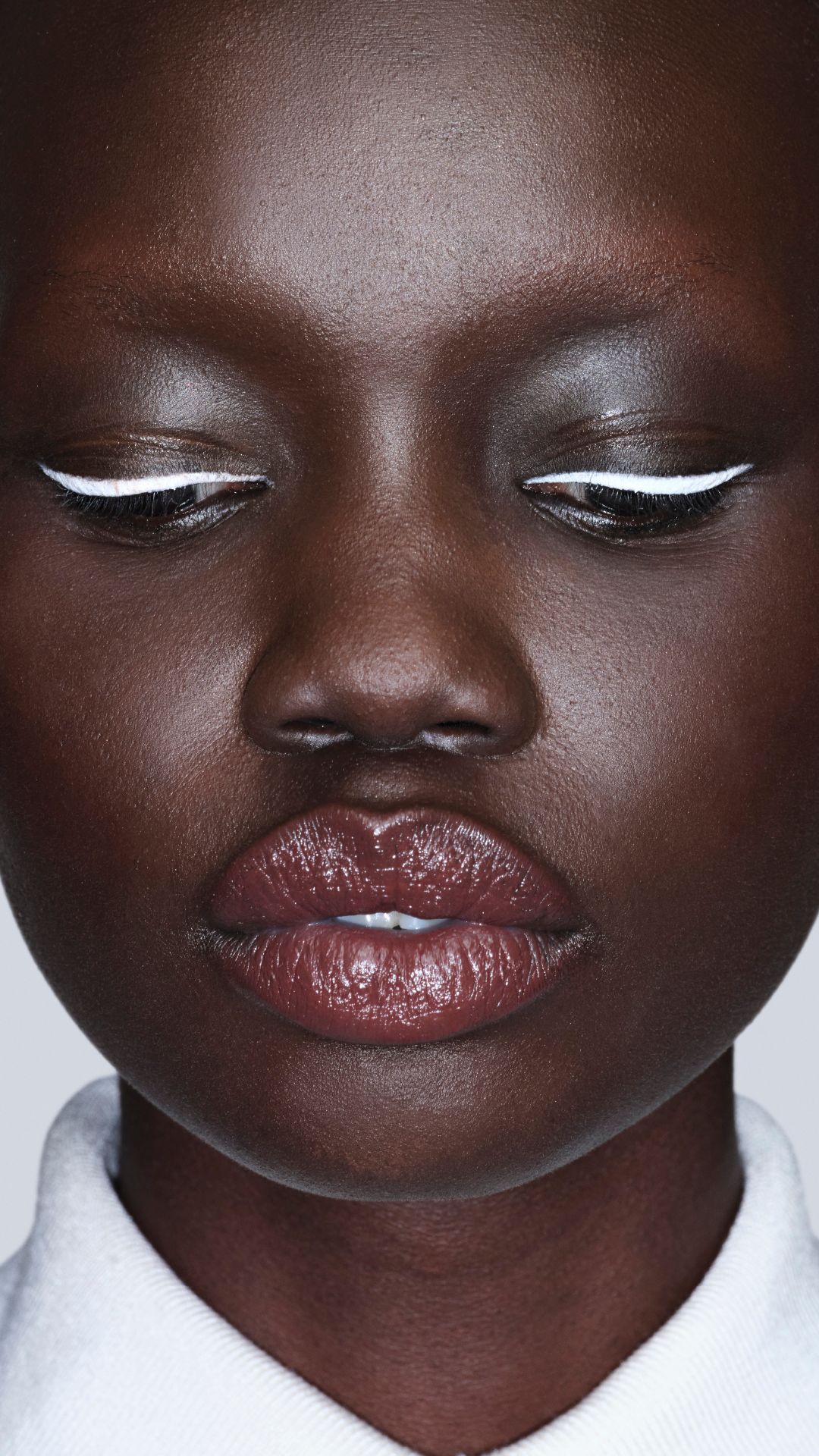 Model wearing white eyeliner