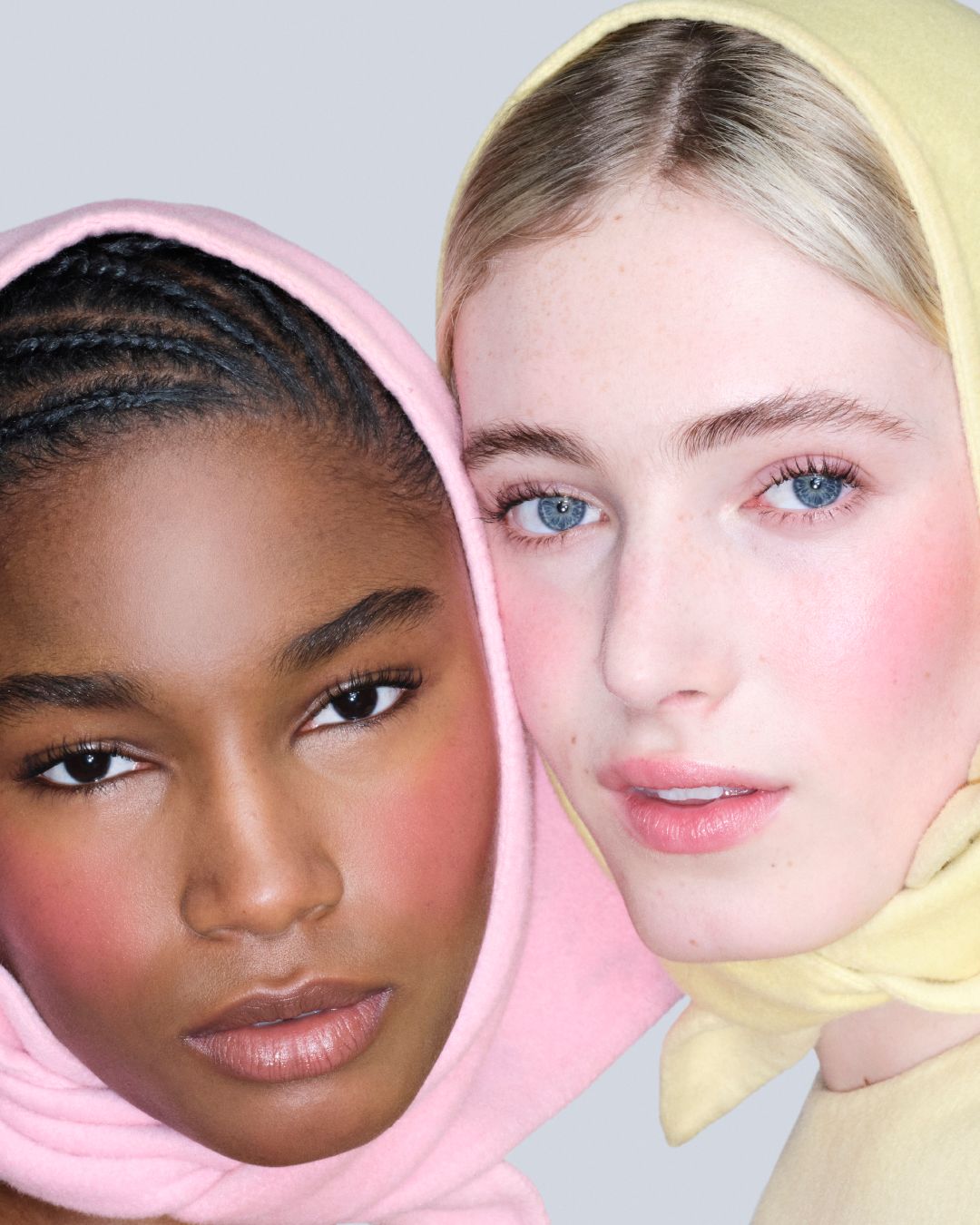 Models wearing pink and yellow headscarfs