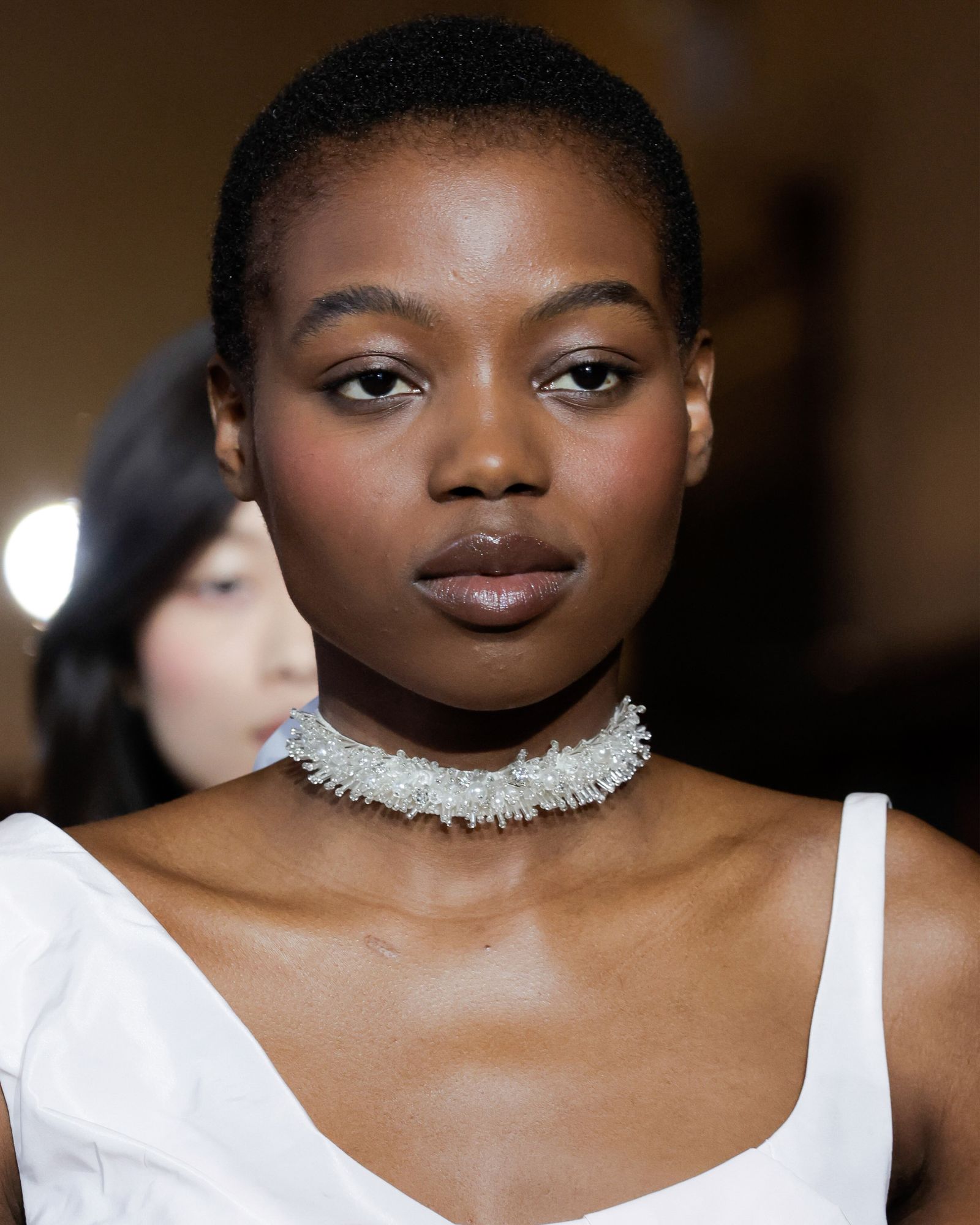 Closeup of a model with matte skin makeup.