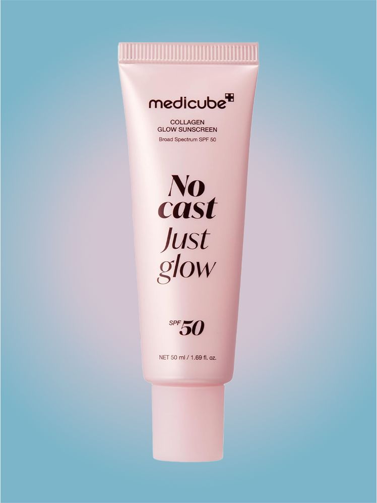Medicube No Cast Just Glow Sunscreen SPF 50 in branded tube component on a pink and blue background