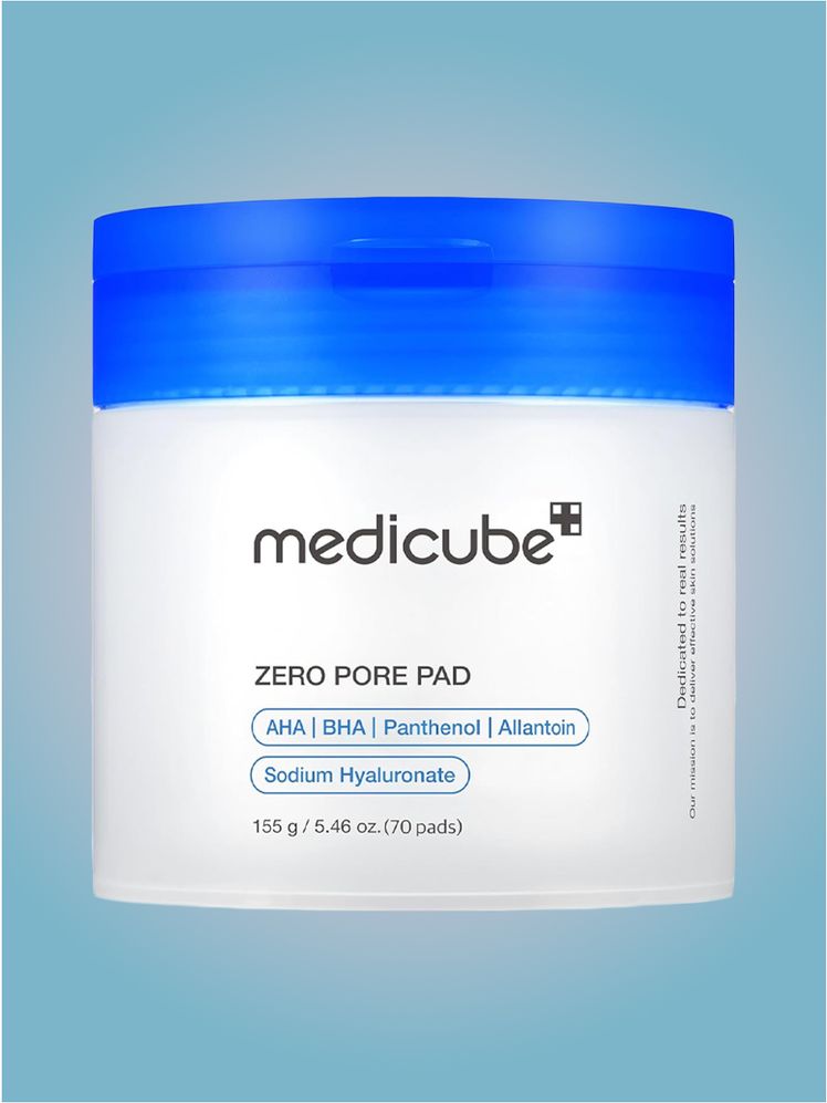 Medicube Zero Pore Pads in branded tub component on a blue and pink background