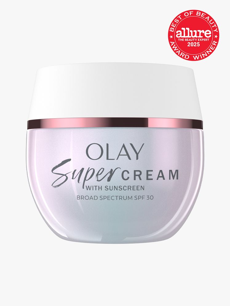 Olay Super Cream With Sunscreen SPF 30 in branded holographic jar with white lid on light gray background with red...