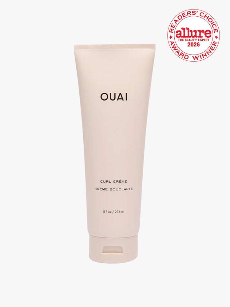 Bottle of Ouai Curl Creme on white background