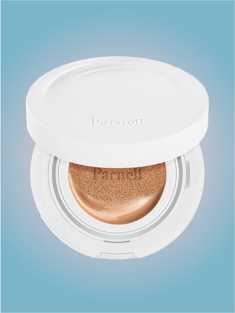 Parnell Serum Cushion Foundation in branded component on a pink and blue background