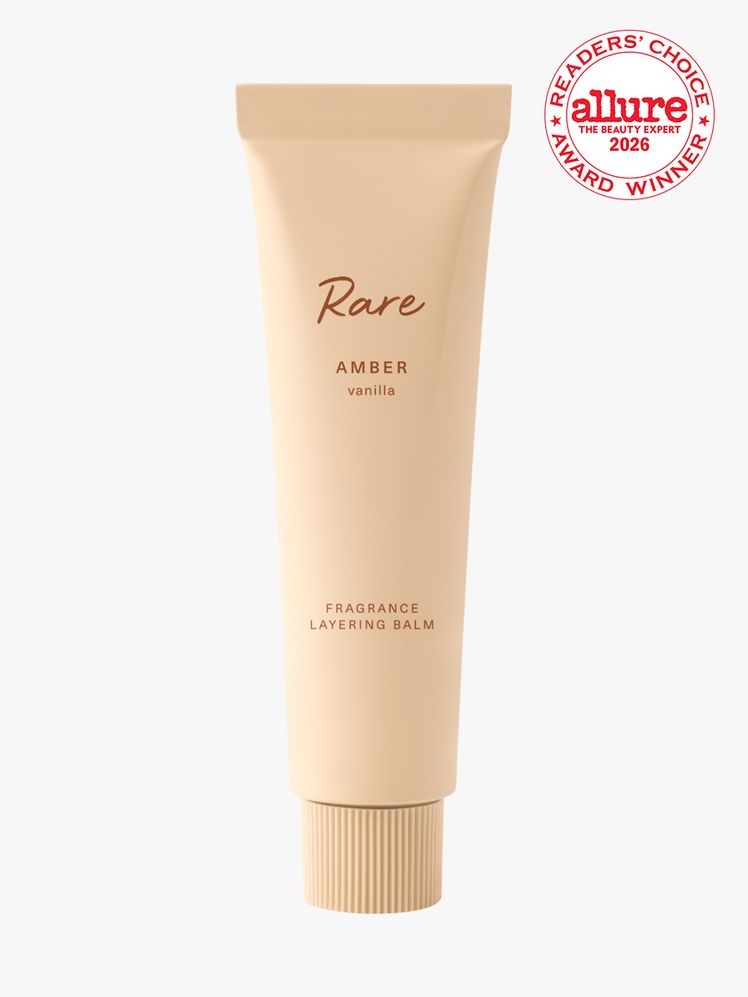 Tube of Rare Beauty Fragrance Layering Balm on a white background
