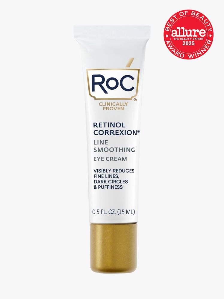 RoC Retinol Correxion Line Smoothing Eye Cream in branded white tube with gold cap on light gray background with red...
