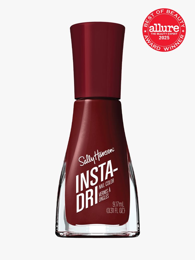 Sally Hansen InstaDri Nail Polish bottle of burgundy nail polish on light gray background with red Allure Best of Beauty...