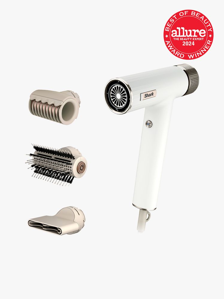shark speedstyle blow dryer in white and gray color way with three different attachments on light gray background with...