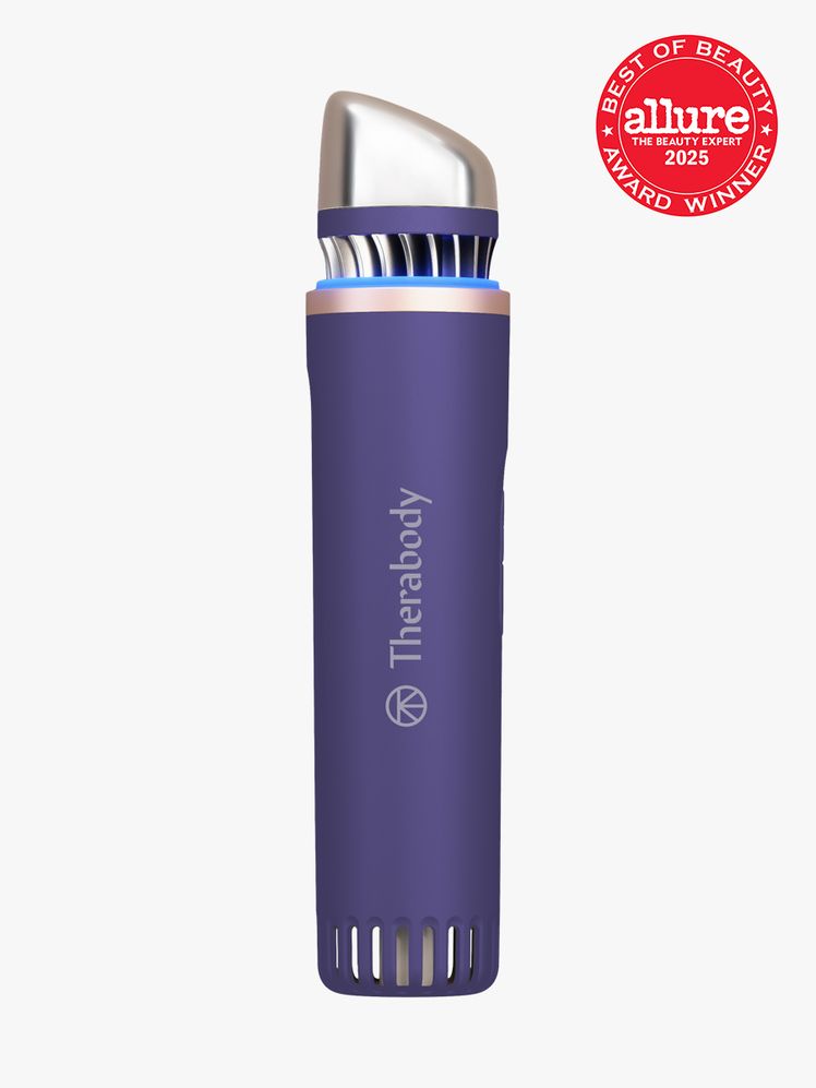 Theraface Depuffing Wand in branded purple color way on light gray background with red Allure Best of Beauty seal in the...
