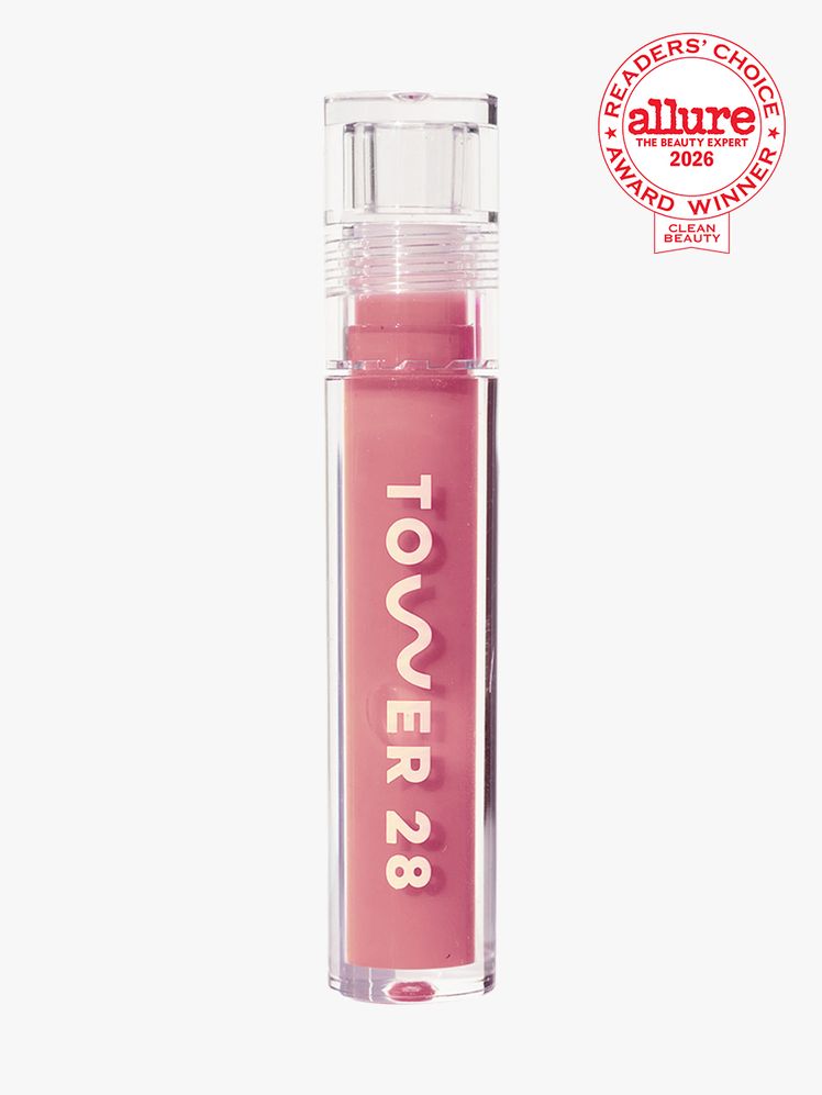A clear Tube of Tower 28 Beauty ShineOn Lip Oil Jelly on a white background