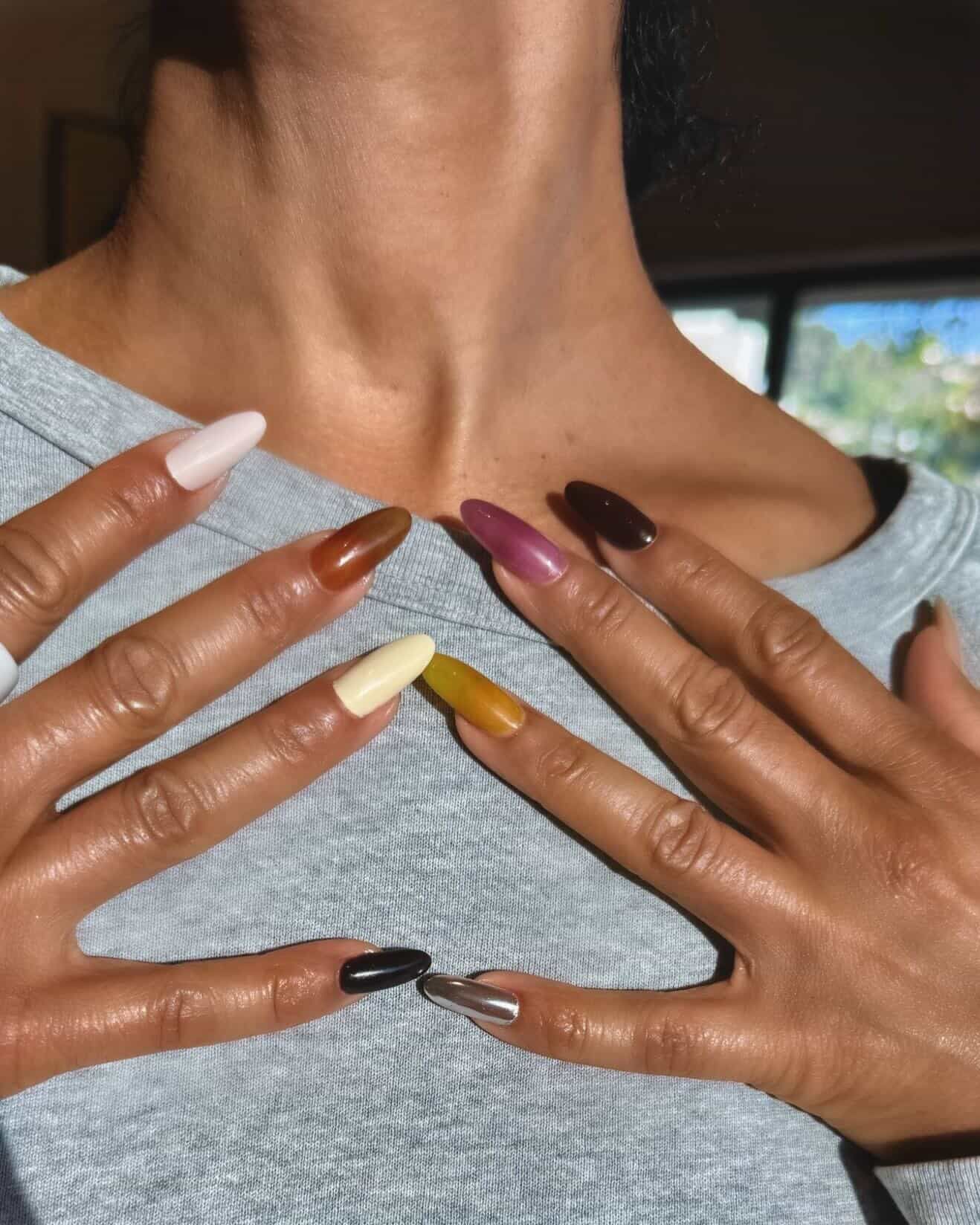 Tracee Ellis Ross shows off her multicolored jelly manicure.