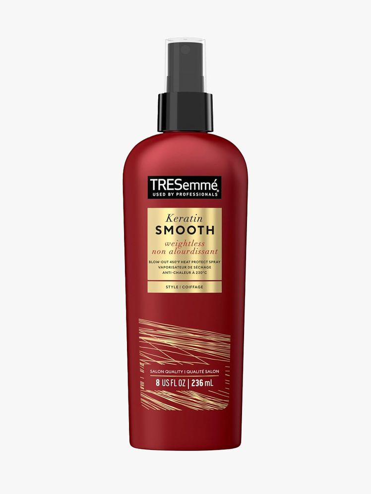 TRESemmé Expert Selection Heat Protection Spray in branded component on a light gray background