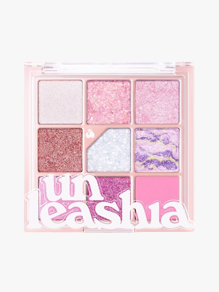Unleashia Glitterpedia Eyeshadow Palette in branded component on a light gray background