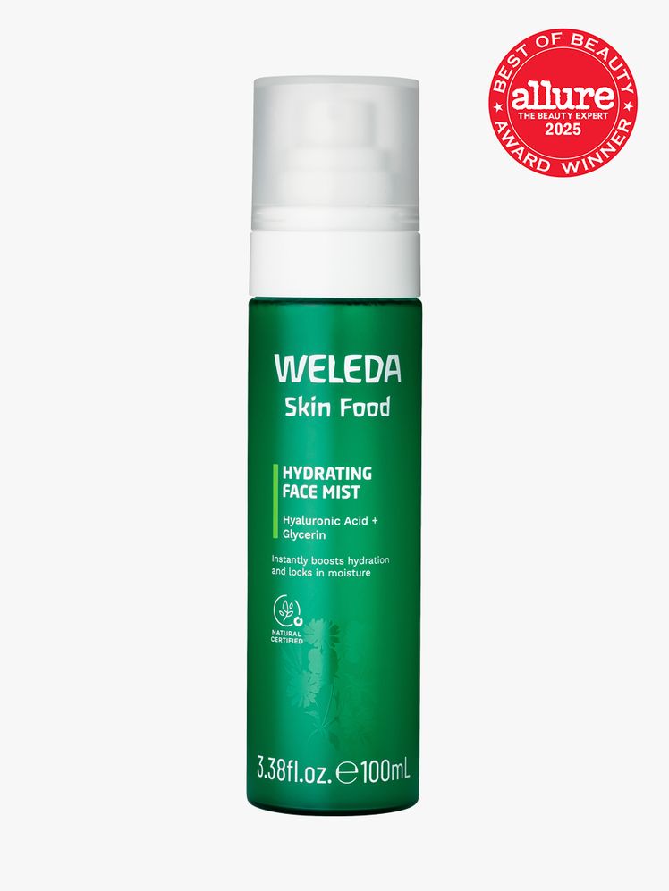 Weleda Skin Food Hydrating Face Mist in branded green bottle with white mist pump on light gray background with red...