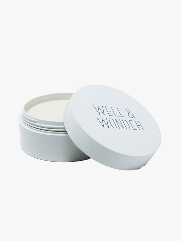 Well Wonder Body Balm white jar on light gray background