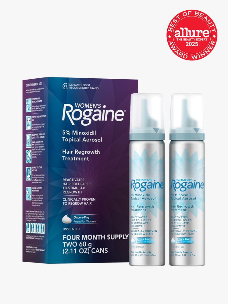 Women's Rogaine 5 Minoxidil Unscented Foam bottles next to branded box packaging on light gray background with red...